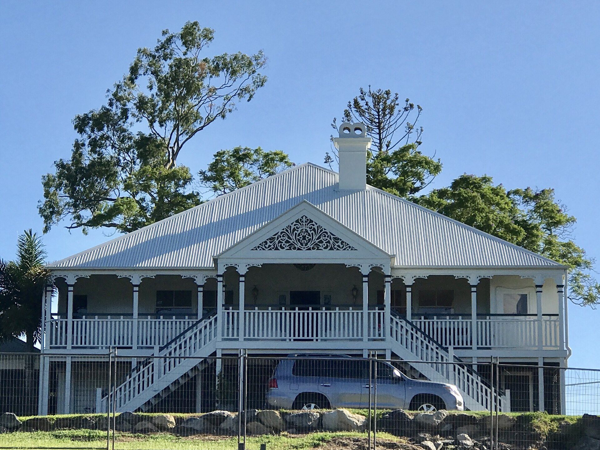 A Kestrel technician treating the stumps of a Queenslander